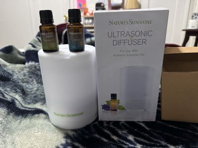 Brand new Nature’s Sunshine Ultrasonic Diffuser with 2 essential oils 5 ml