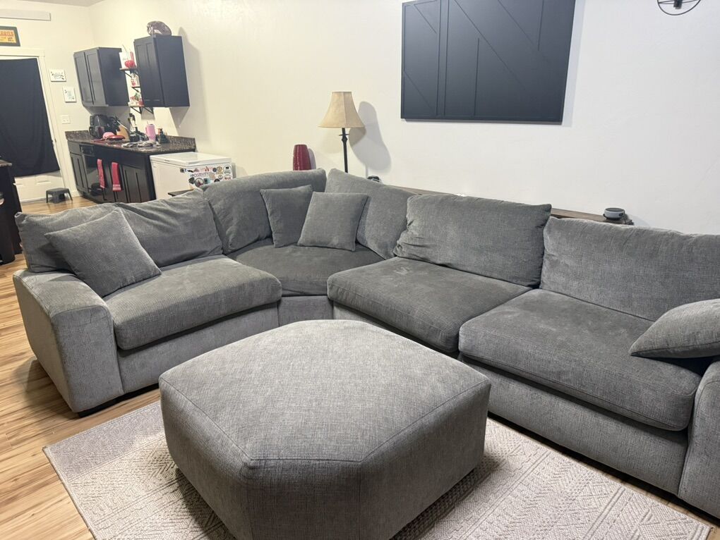 Gray 4 piece sectional with ottoman
