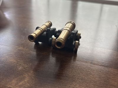 Movable toy cannons