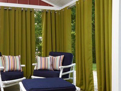 LIKE NEW 4 outdoor curtain panels. $25