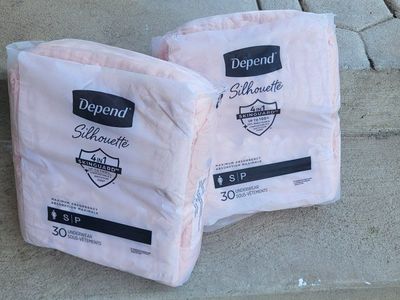 2 packs of Depends size small silhouette one opened and used a couple
