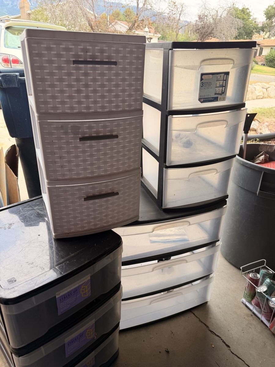 4 three drawer style plastic storage/filing cabinets