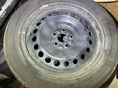 Four 5x100 16inch steelies with good tires