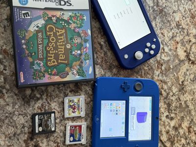 Nintendo switch lite and 2DS with games