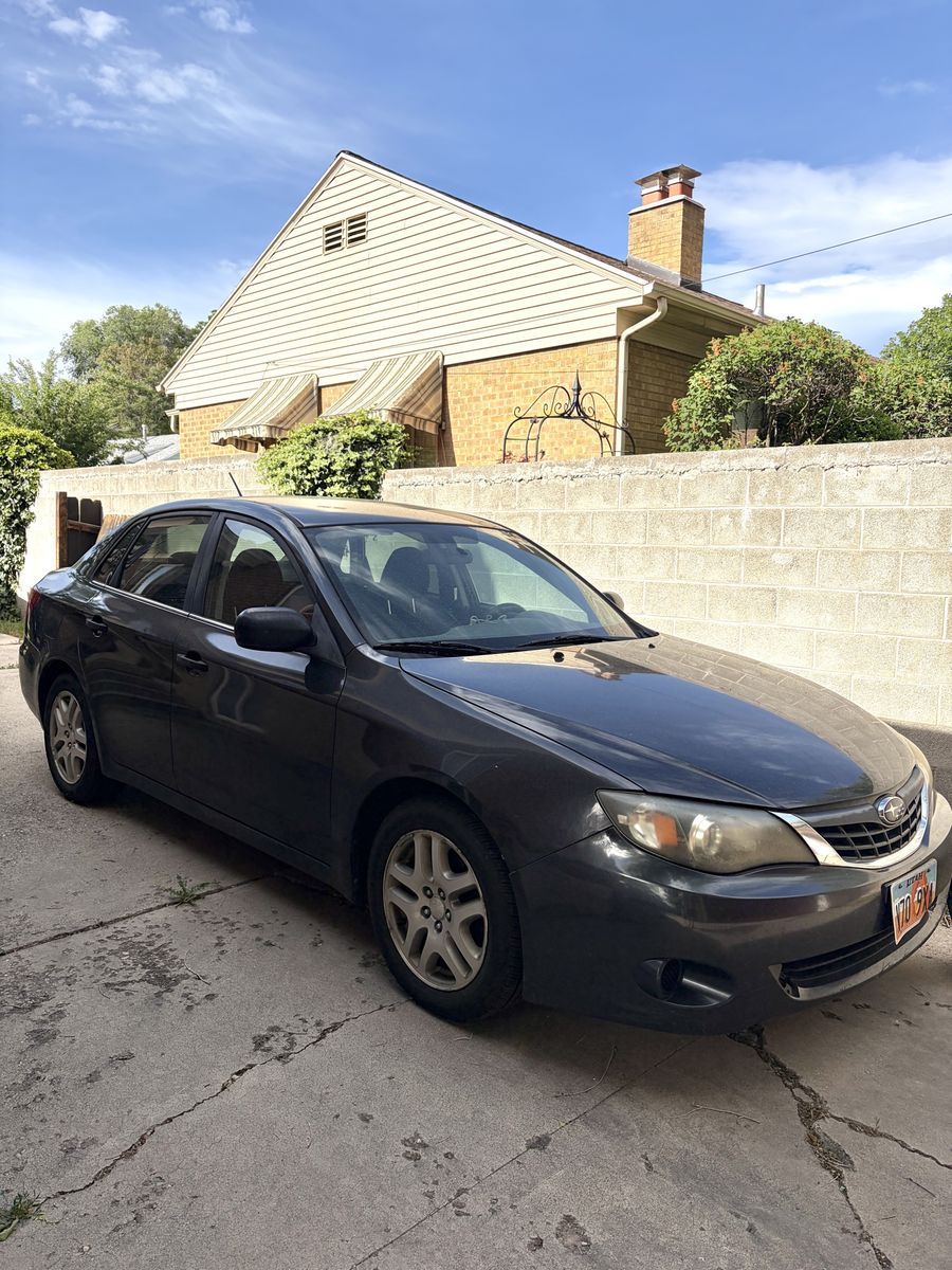 Subaru Impreza Sedan 2008, 168,000 miles (blue gray)