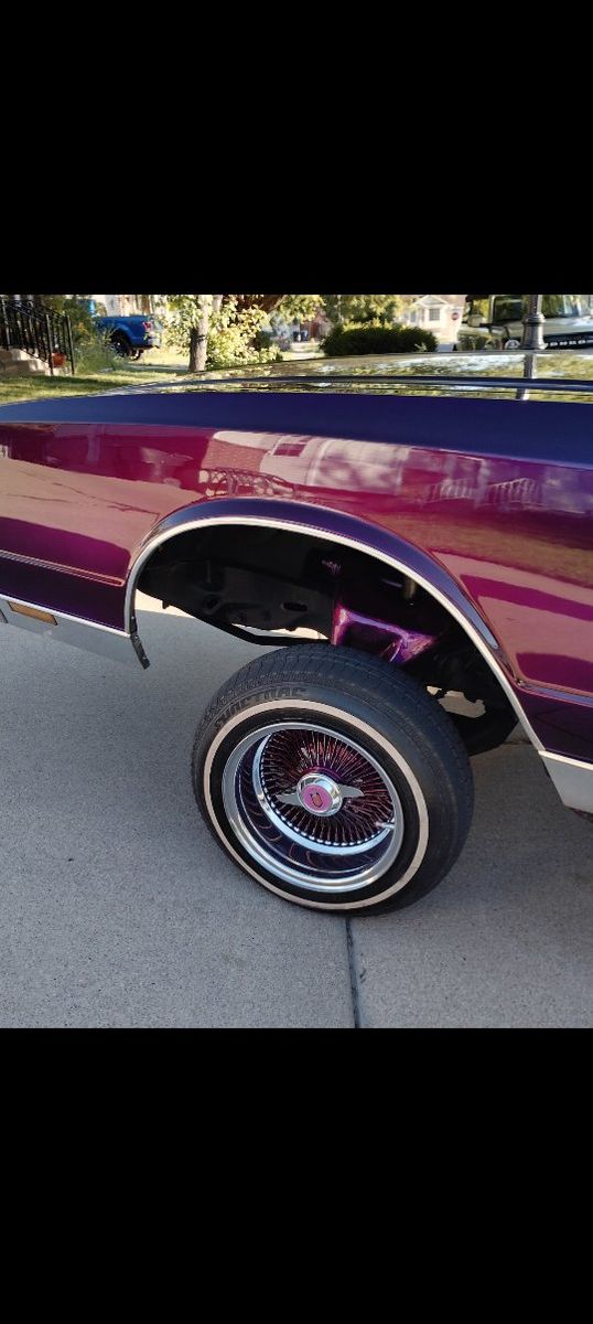 13x7 reversed offset chrome wire wheels powder coated Monte Carlo emblem