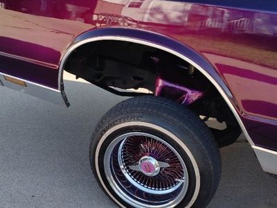 13x7 reversed offset chrome wire wheels powder coated Monte Carlo emblem