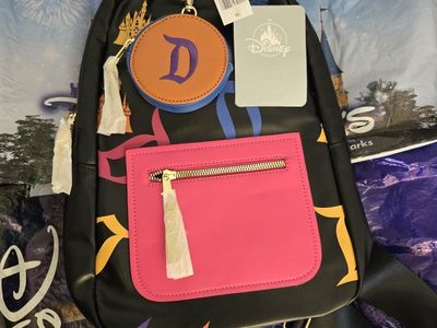 Disney Parks Sling Backpack Black with Colorful Prints and Coin Pouch New with Tags