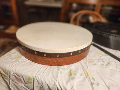 Real Irish Boudhran drum, Made in Ireland, of goatskin and birch. With bag. Sounds great. Do damage or any problems.