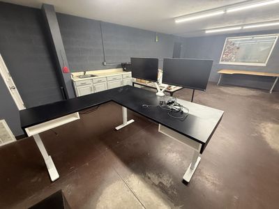 L-Shaped Motorized Adjustable Standing Desk with Shelving & Storage Units. With or without dual monitors