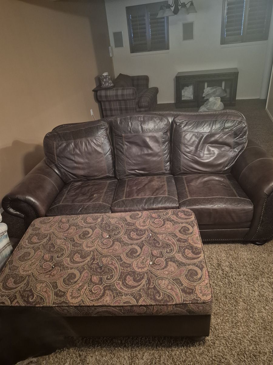 Leather couch and automan.