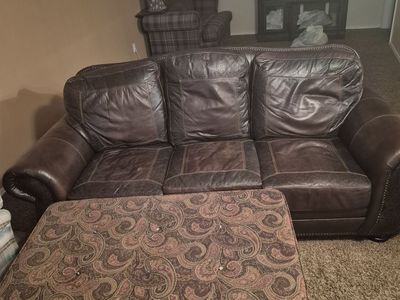 Leather couch and automan.