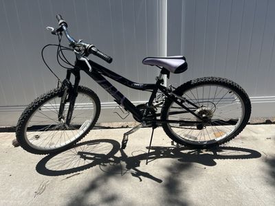 24 inch bicycle- Great for someone approximately 4’2” - 4’9” tall.