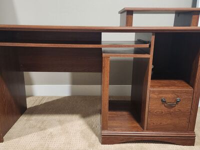 Computer Desk with files and surge protectors