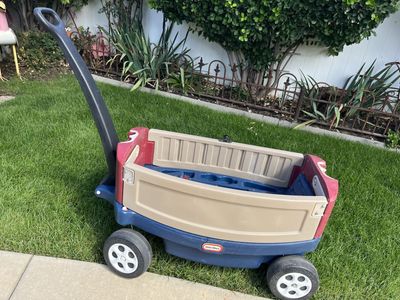 Deluxe little tikes wagon for 2 kids seating.