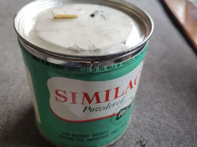 1950's Similac Cans with lids and price tag.