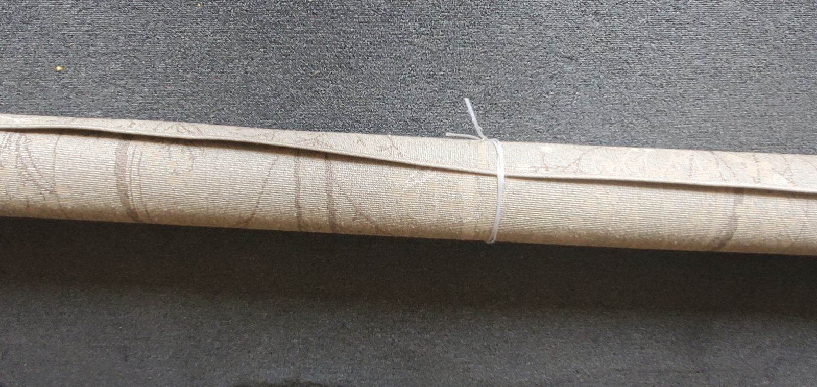 Rolled Beige Patterned Area Rug 8ft x 10ft