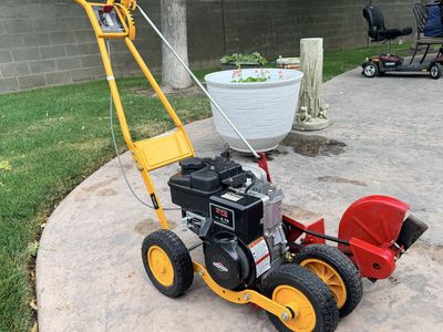 McLane 9-Inch Gas Walk Behind Lawn Edger powered by a 148cc Briggs & Stratton 475 Series engine.