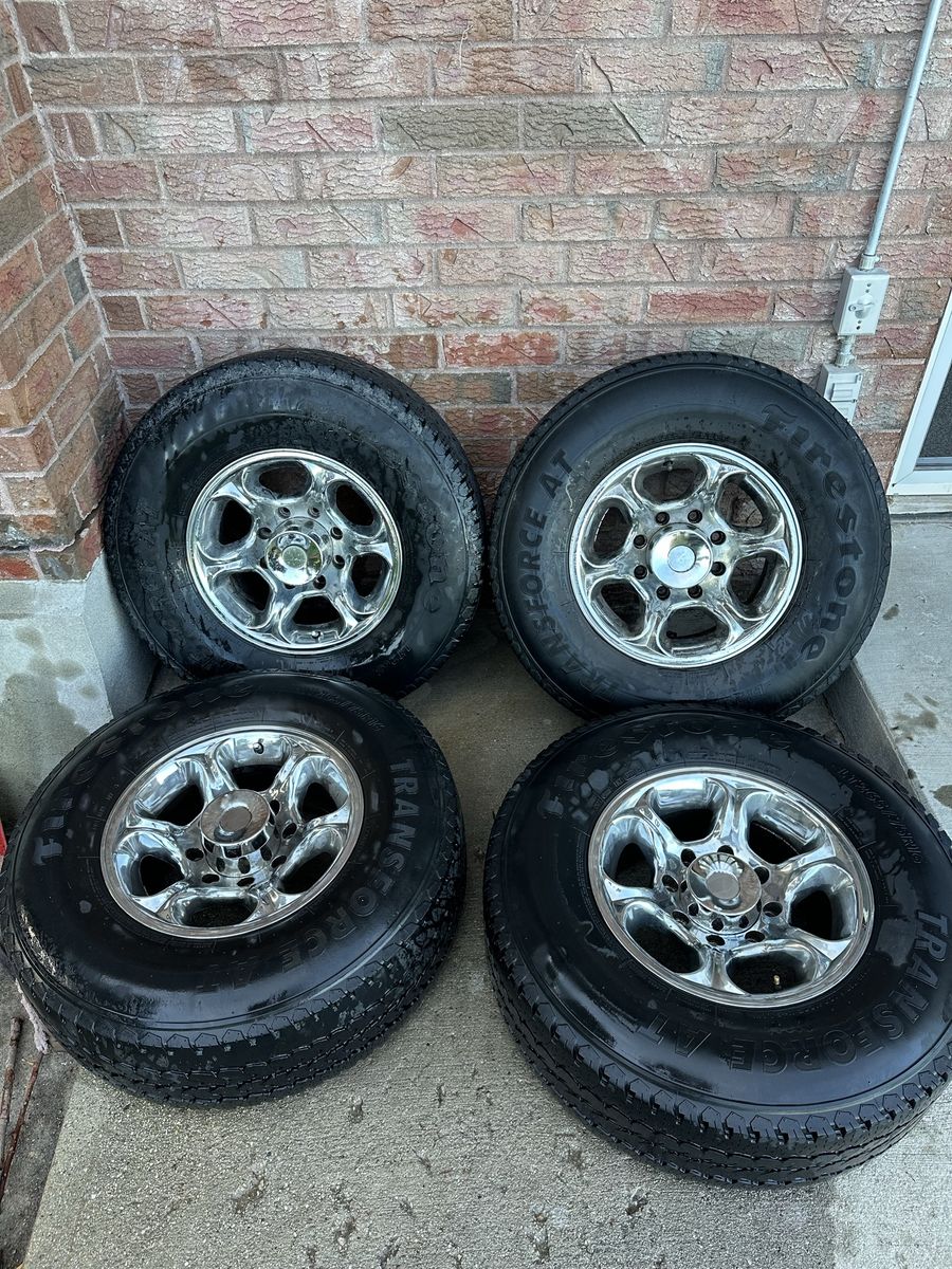 Firestone Transforce AT LT265/75R16 Tires on Chrome Wheels