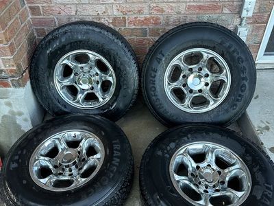 Firestone Transforce AT LT265/75R16 Tires on Chrome Wheels
