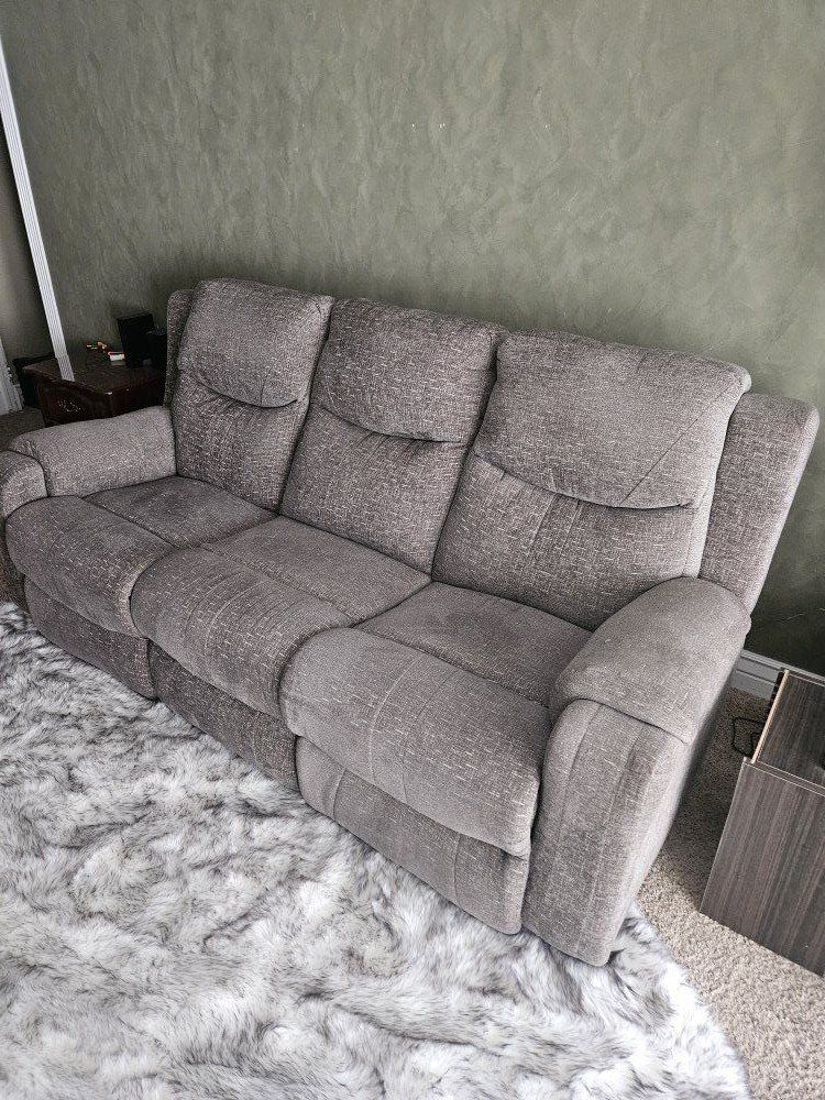 Power Reclining Sofa with Adjustable Headrest