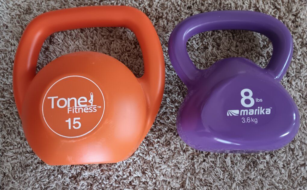 Weighted cattlebells and exercise ball & a dumbbel