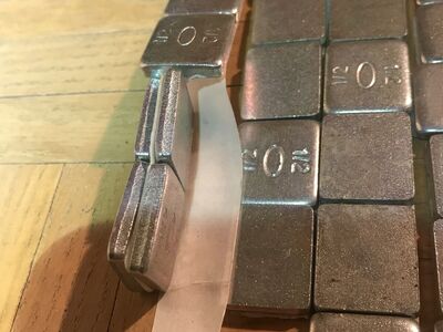 Self adhesive weights made for balancing tires OR for other things just peel and stick