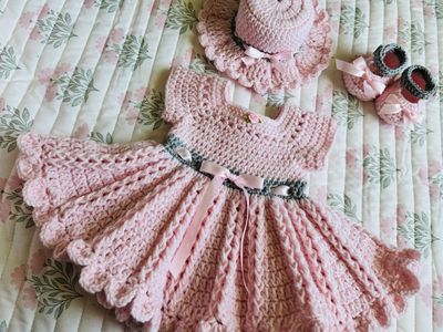 Hand crochet baby dress set with a hat and shoes