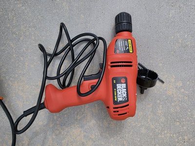 BLACK+DECKER 5A 0-1350 RPM Corded Electric Drill with Hole Saw
