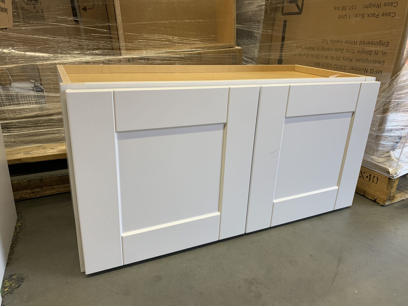 Hampton Bay Shaker 30 in. W x 12 in. D x 15 in. H Assembled Wall Bridge Kitchen Cabinet in Satin White