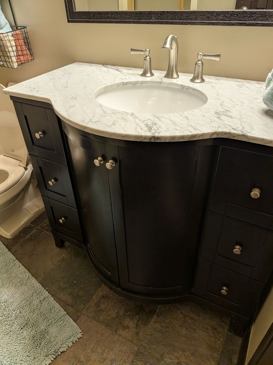 Dark Wood Bathroom Vanity with Marble Countertop, Undermount Sink, and Faucet