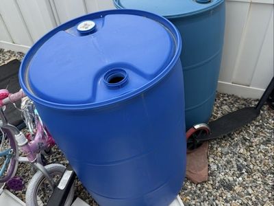 Blue 55-Gallon Plastic Drums