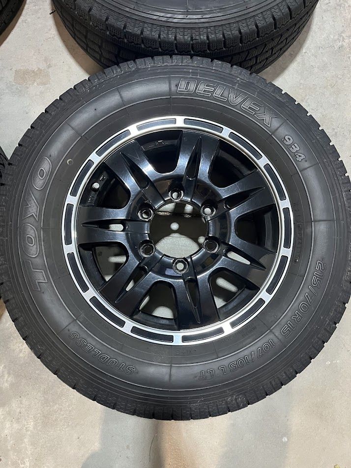 Four - 15 Inch Wheels and Tires