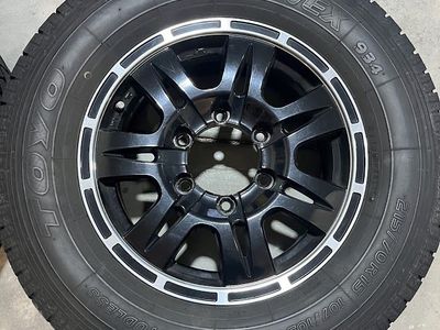 Four - 15 Inch Wheels and Tires