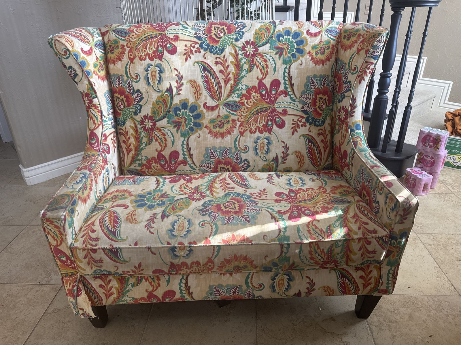 Floral wingback loveseat