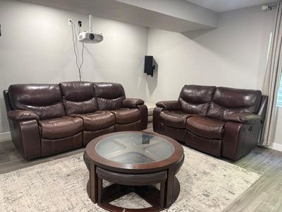 Brown Leather Reclining Sofa and Loveseat Set - Comfortable Living Room Seating + Center Table