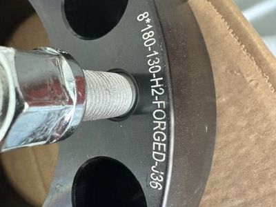 A pair of 2" spacers for 8 x 180. Used once for a GMC Sierra 2500HD