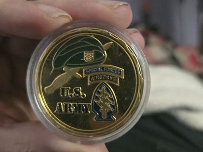 Gold challenge coin