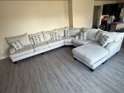 Large Light Gray Sectional Sofa with Chaise and Throw Pillows