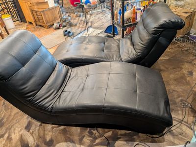 Two Black Vinyl Chaisse's