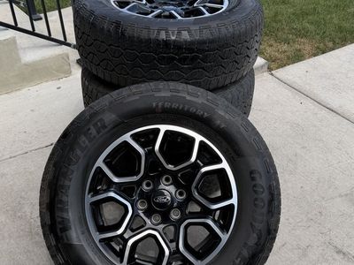 Ford F150 Rims and Tires 275/65R18 Goodyear Wrangler Territory AT