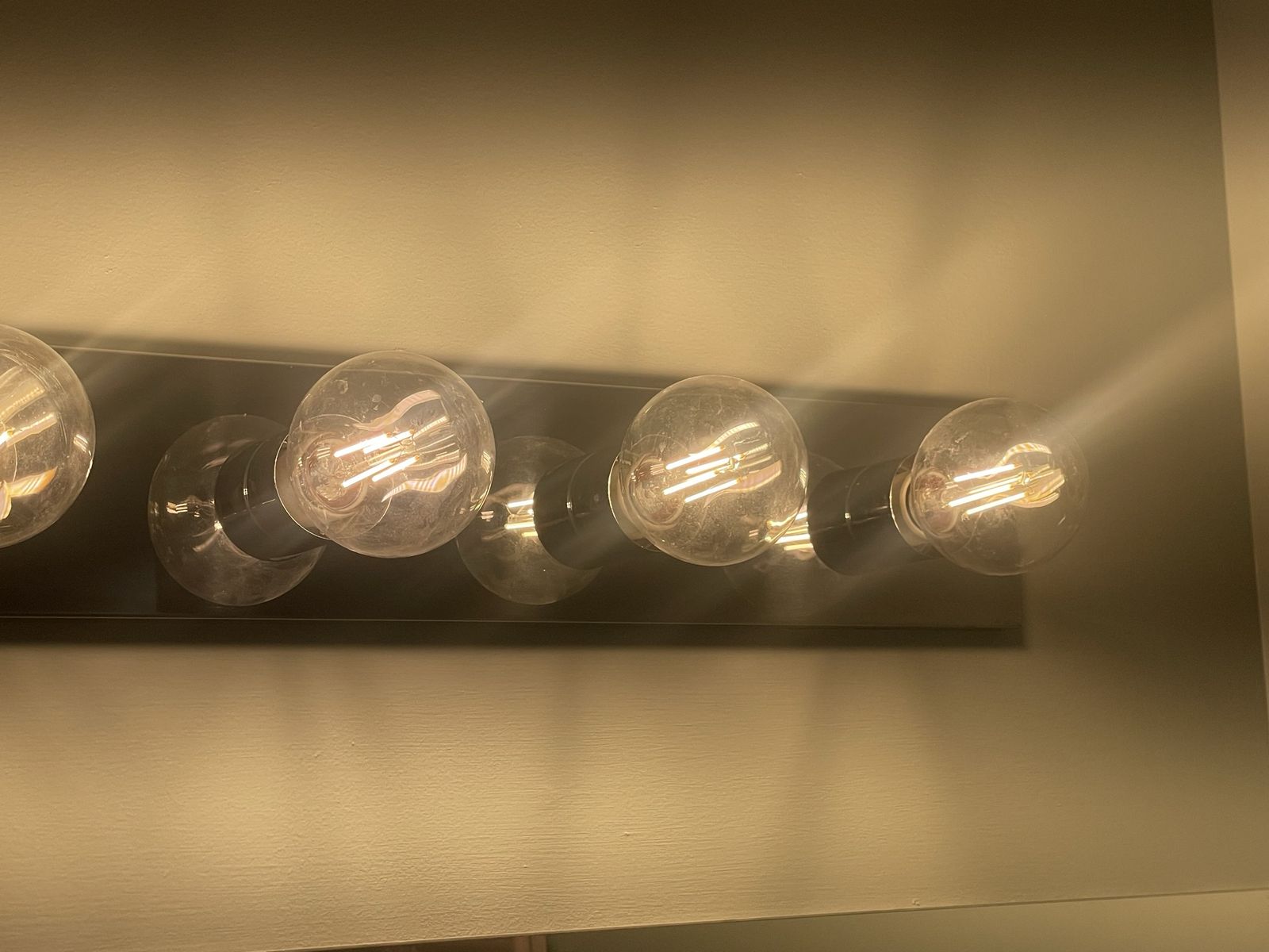 4-light bathroom vanity fixture with chrome backplate and 4 working LED filament Edison style bulbs