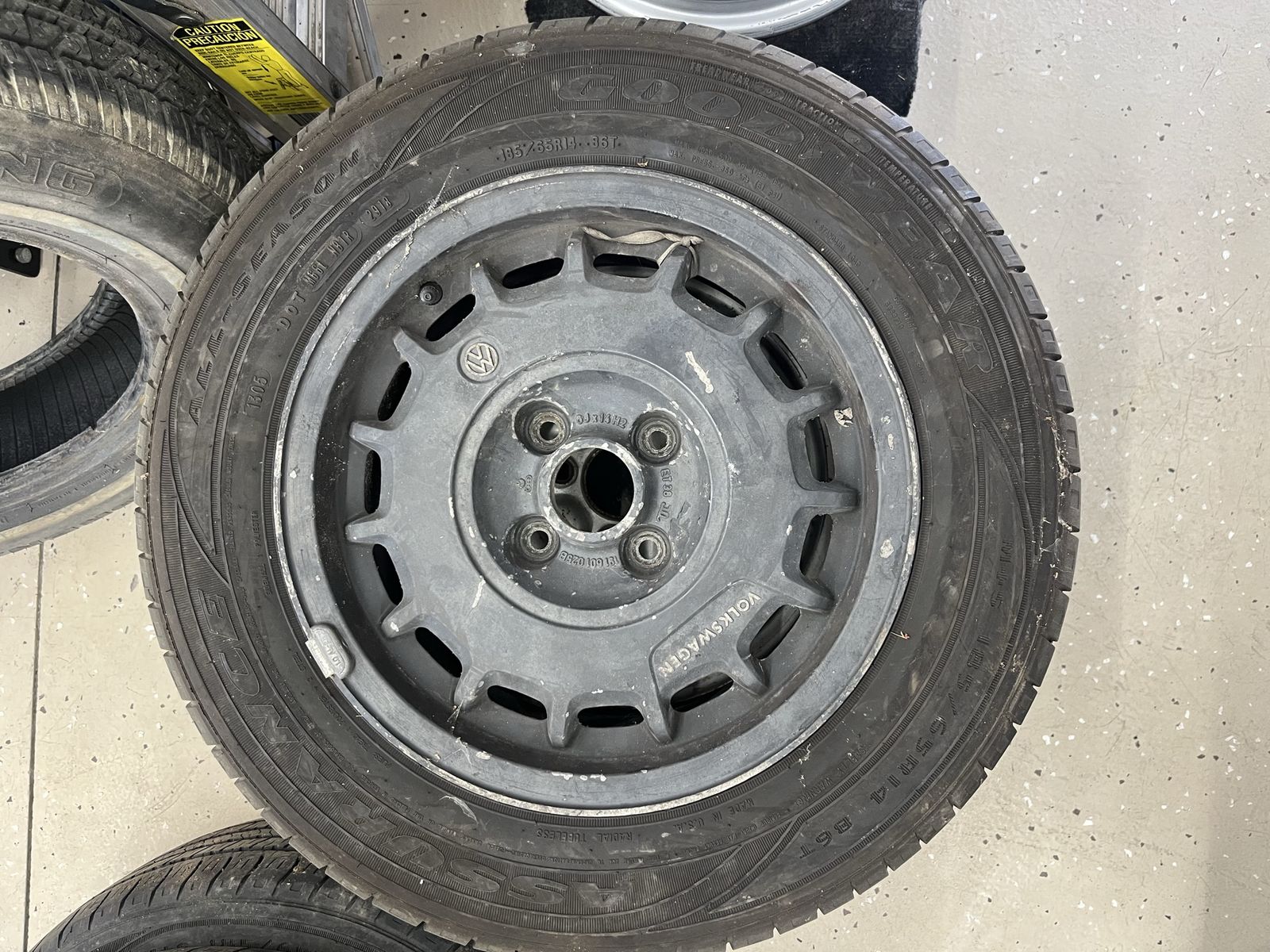 OEM Volkswagen 14" Bottlecap Alloy Wheel with Goodyear Assurance 185/65R14 Tire