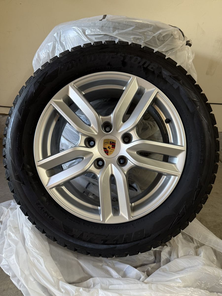 A set (4) of Porsche wheels with Bridgestone winter tires