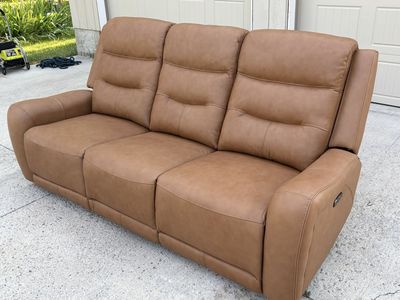 Beautiful Cowhide Leather Sofa with Power recline and headrest!