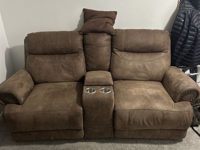 Brown Microfiber Reclining Loveseat with Center Console and Cup Holders. $100 or best offer.