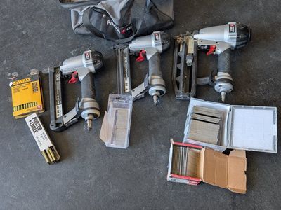 3 piece Porter-Cable pneumatic nail gun kit with plenty of Staples and nails!