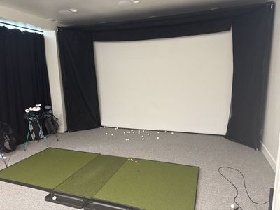 Golf simulator screen and hitting mat