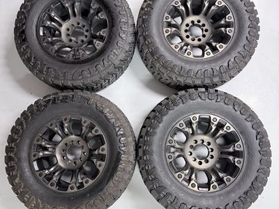 Like new 35” (35X12.5x18) Tires with Beadlock style wheels