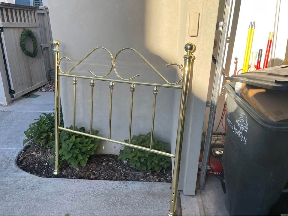 Full size brass headboard